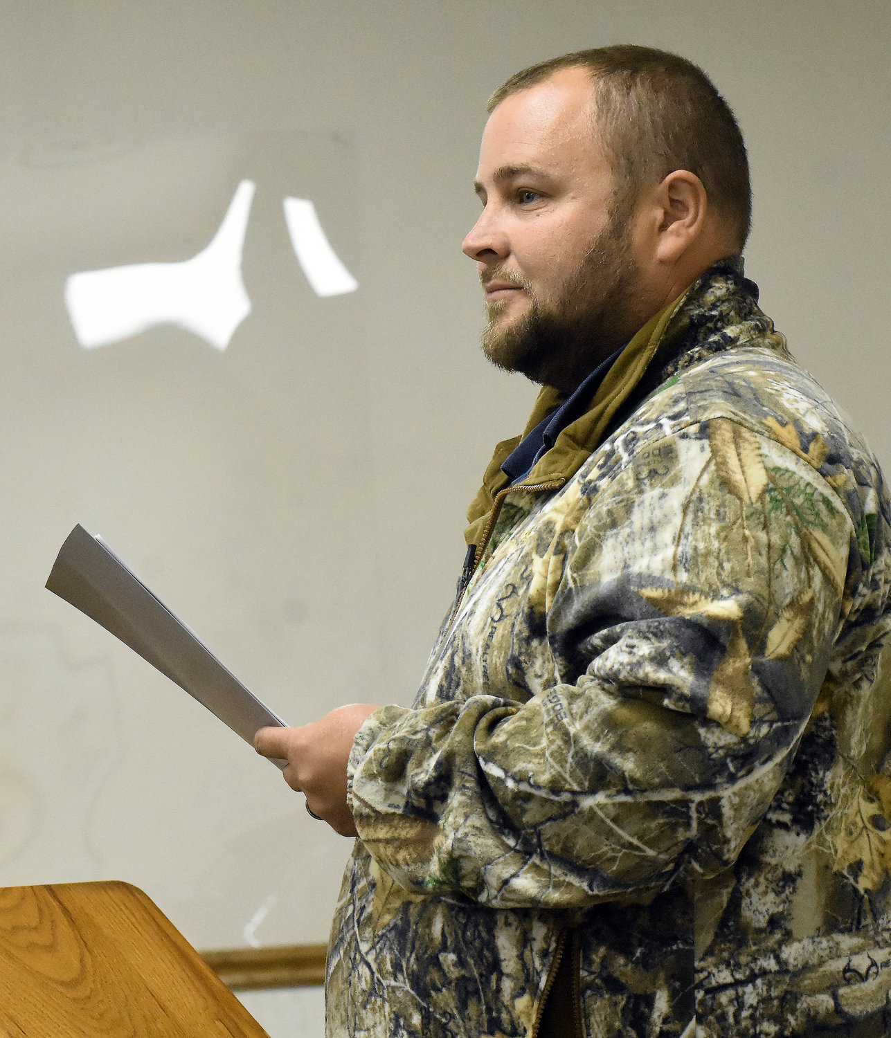 Christopher Dempsey fields questions during an Oct. 17 public hearing from Owensville’s Board of Aldermen on a his proposal to building apartments on land currently used as a mobile home park. Two vacant houses will also be remove during the project.